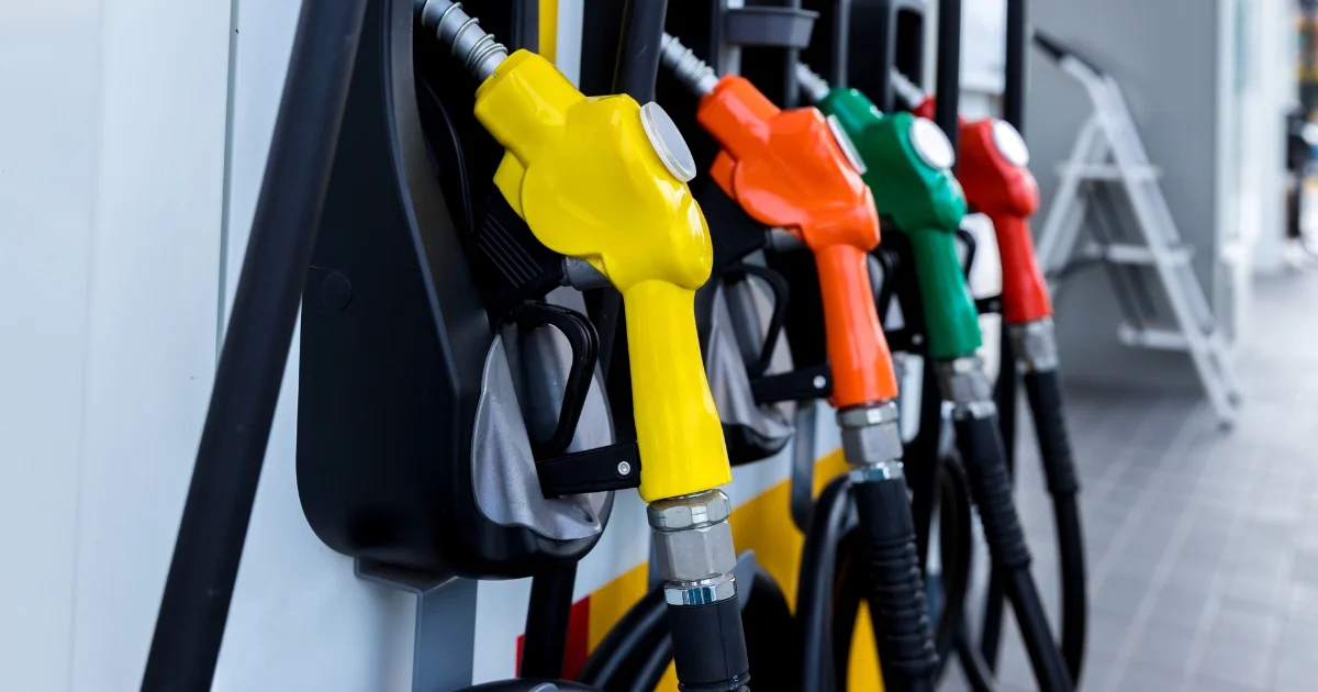 Coloured fuel pumps at a petrol station